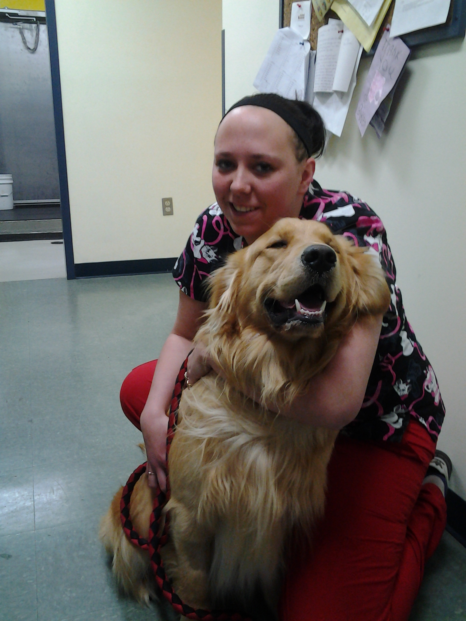 Kaitlyn loving her dog, Duke